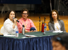 Leila Tamari, Sean Starowitz, and Hope Knight sit behind a table