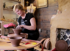 Image of Renée Margocee at the pottery wheel