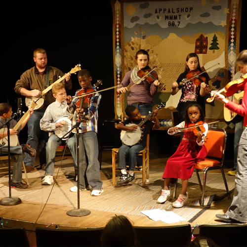 Schoolchildren perform with Appalshop staff in Whitesburg, Kentucky. Photo by Mimi Pickering.