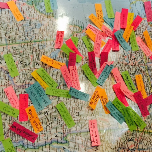 Close-up street map with various colorful papers on it