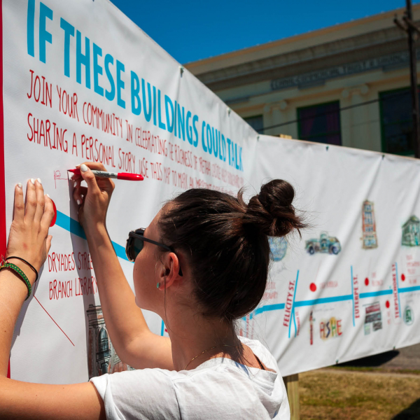 If These Buildings Could Talk, an interactive installation designed by students at YEP Design Works that activated a vacant lot and invited community members to share their stories and memories of Oretha Castle Haley Blvd.